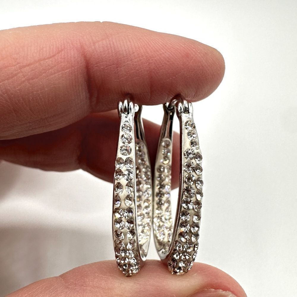 Pave Crystal rhinestones and silver tone metal hoop earrings!